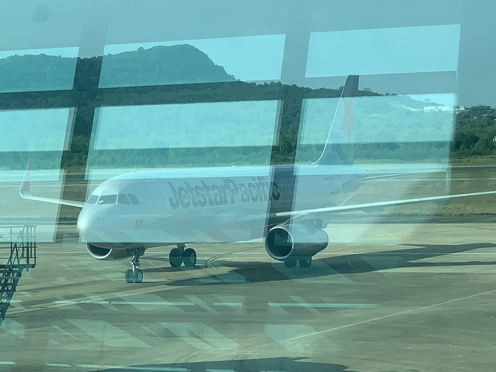 International and domestic flights use the same terminal. Photo: Martin Lewison, CC BY 2.0, via Wikimedia Commons A VietJet aircraft on the stand at Phu Quoc International Airport