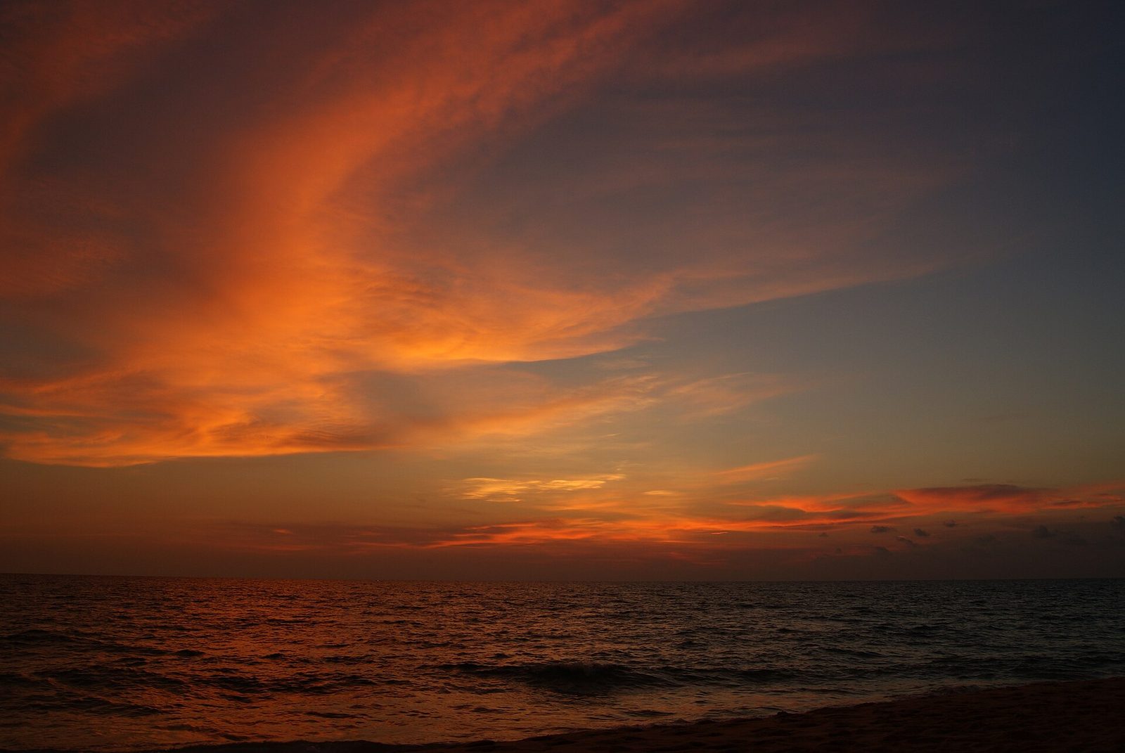 Sunset over the Gulf of Thailand from Phu Quoc's west coast, the view Long Beach hotels are booked for